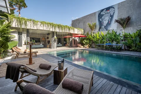 Concrete Serenity's art-lined pool courtyard