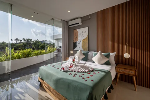 A warm timber bedroom at Villa Soluna